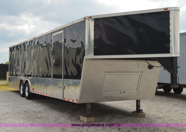 image for item I6498 2011 Typhoon Hurricane enclosed trailer