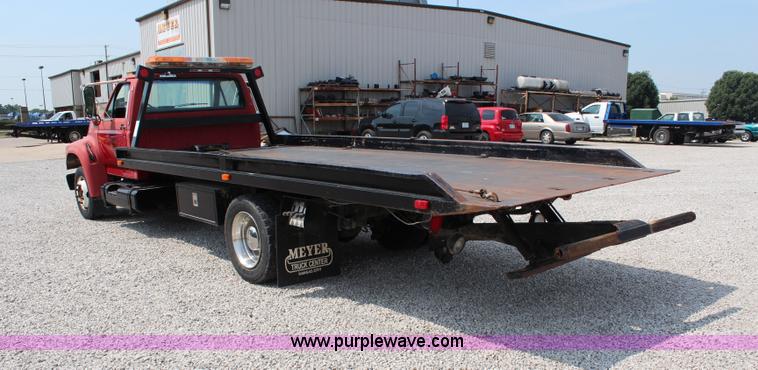 image for item J1080 1997 Ford F800 roll back truck