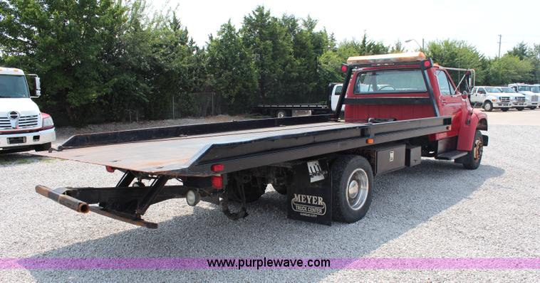 image for item J1080 1997 Ford F800 roll back truck