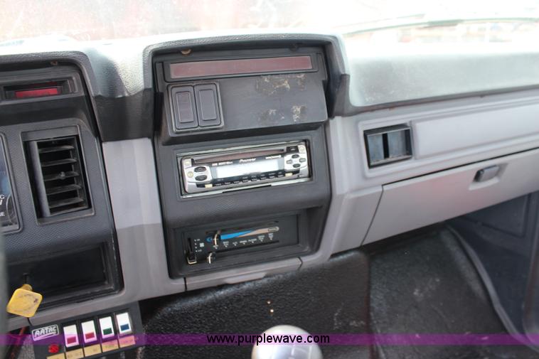 image for item J1080 1997 Ford F800 roll back truck