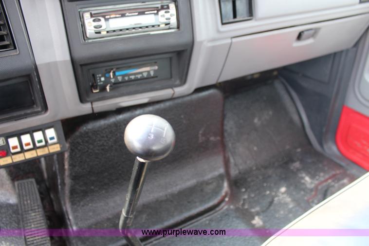 image for item J1080 1997 Ford F800 roll back truck