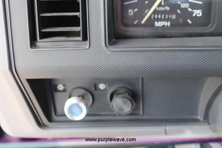 image for item J1080 1997 Ford F800 roll back truck