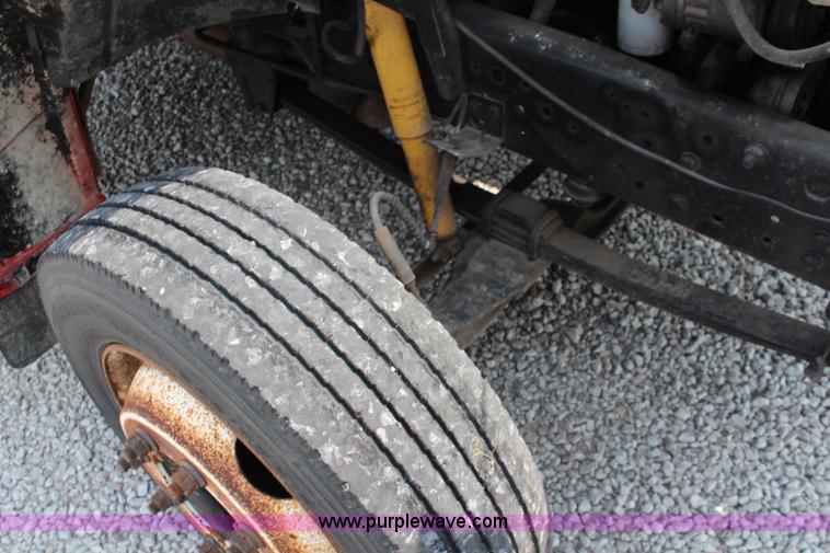 image for item J1080 1997 Ford F800 roll back truck