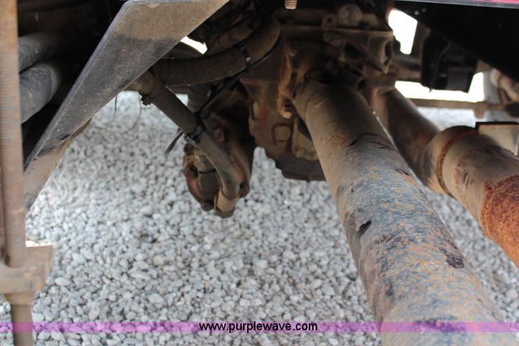 image for item J1080 1997 Ford F800 roll back truck