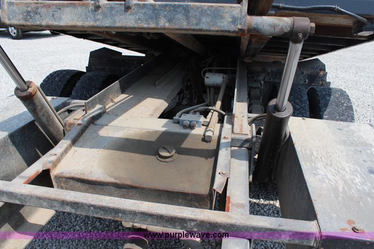 image for item J1080 1997 Ford F800 roll back truck