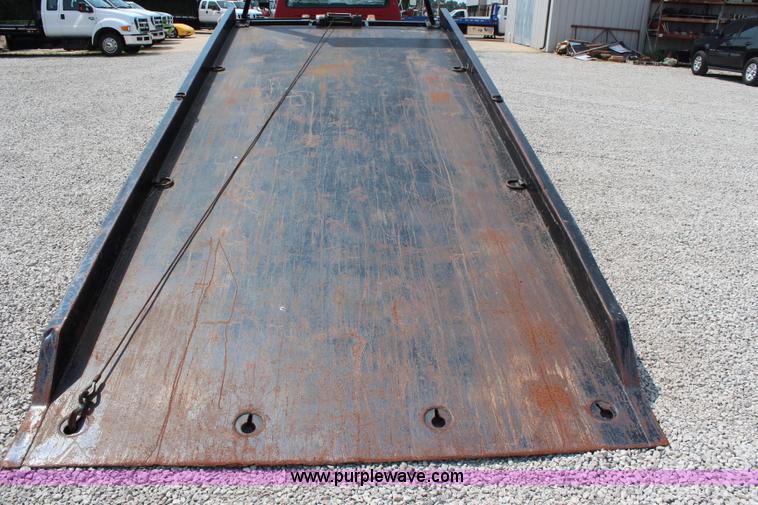 image for item J1080 1997 Ford F800 roll back truck