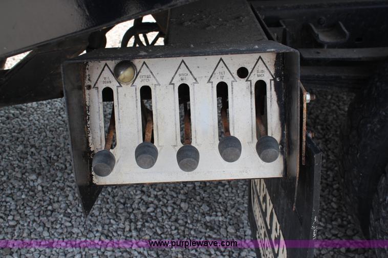 image for item J1080 1997 Ford F800 roll back truck