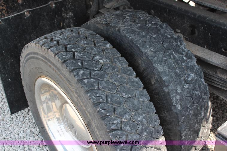 image for item J1080 1997 Ford F800 roll back truck