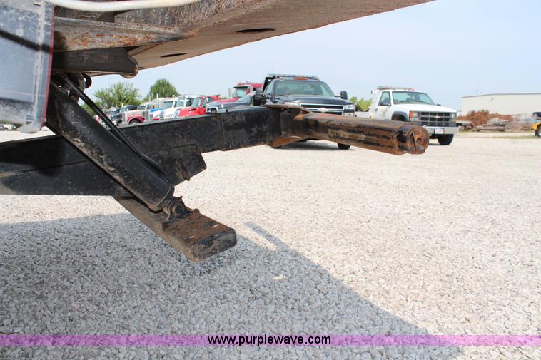 image for item J1080 1997 Ford F800 roll back truck