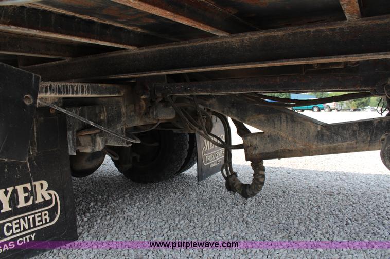 image for item J1080 1997 Ford F800 roll back truck