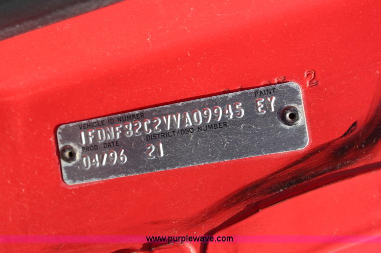 image for item J1080 1997 Ford F800 roll back truck