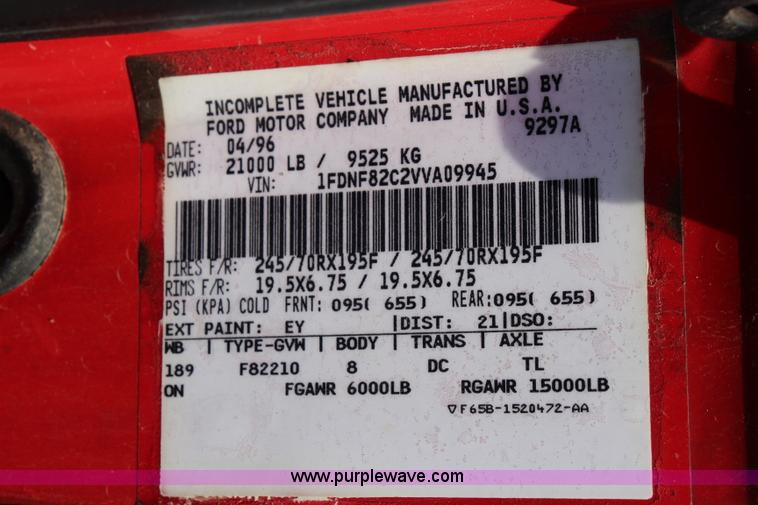 image for item J1080 1997 Ford F800 roll back truck