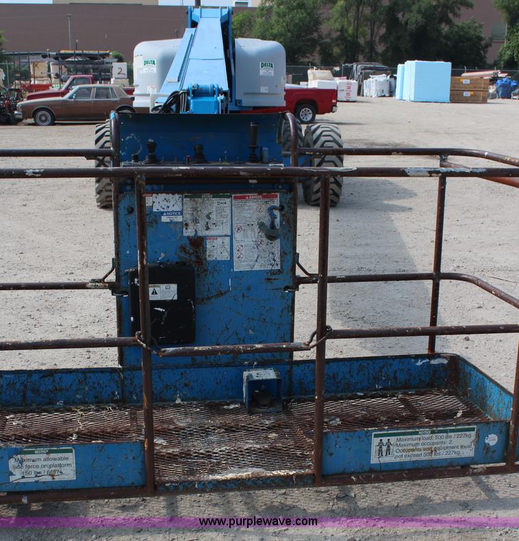 image for item J1081 1999 Genie S85 boom lift