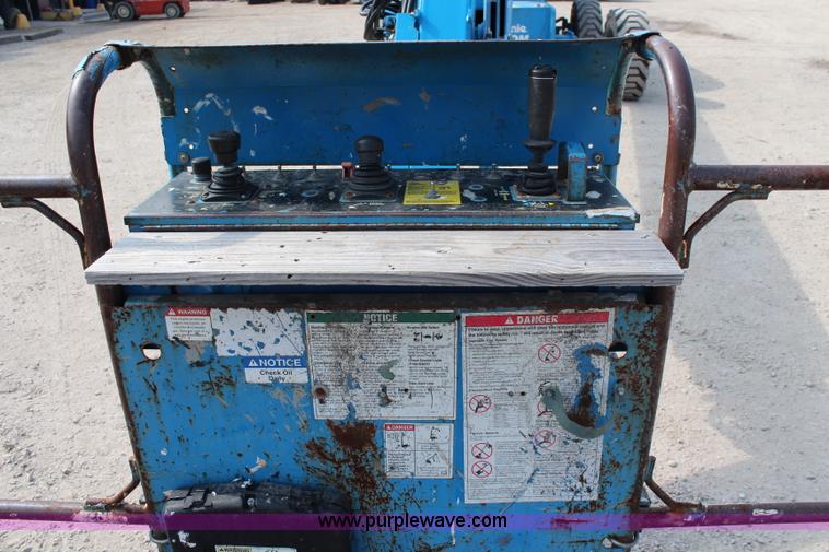 image for item J1081 1999 Genie S85 boom lift