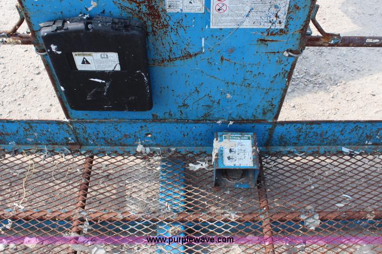 image for item J1081 1999 Genie S85 boom lift