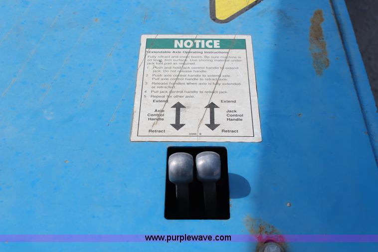 image for item J1081 1999 Genie S85 boom lift