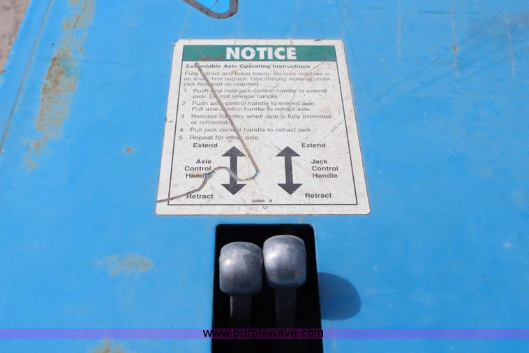 image for item J1081 1999 Genie S85 boom lift