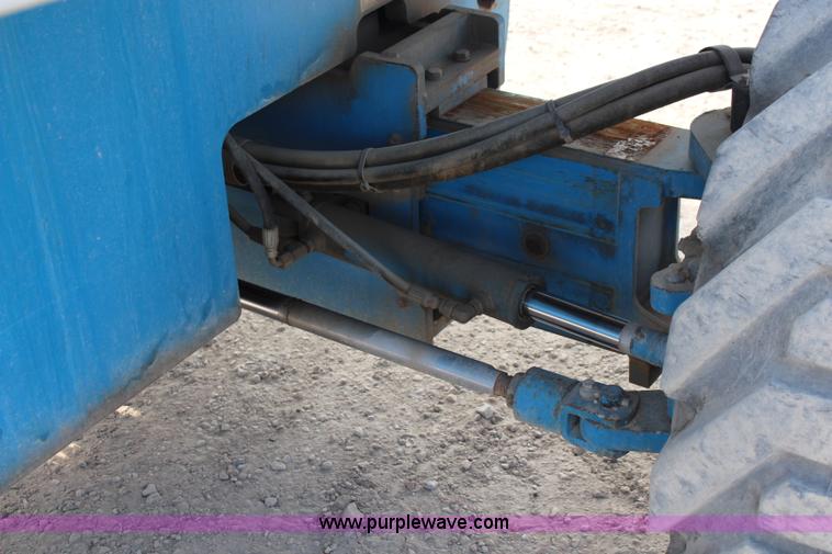 image for item J1081 1999 Genie S85 boom lift