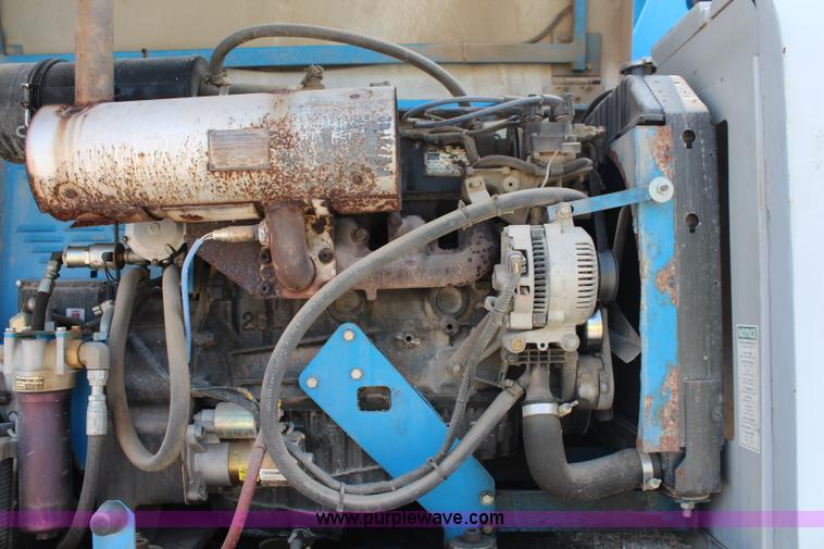 image for item J1081 1999 Genie S85 boom lift