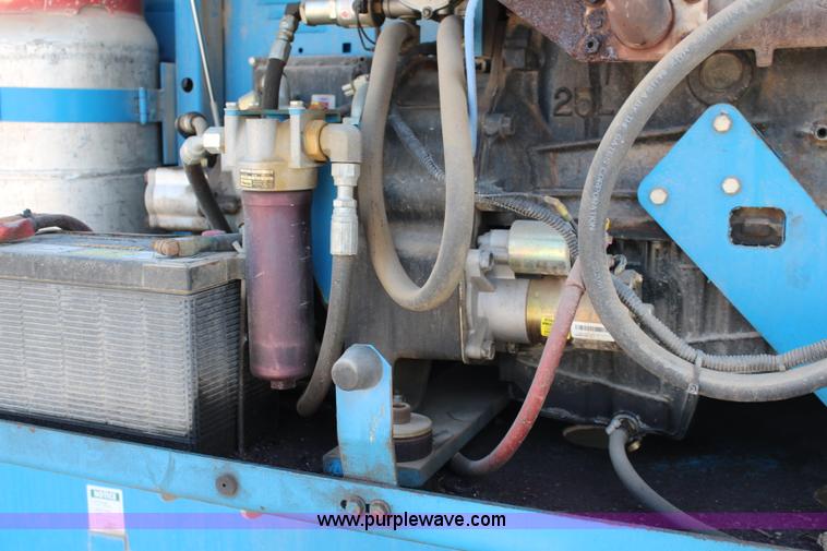 image for item J1081 1999 Genie S85 boom lift