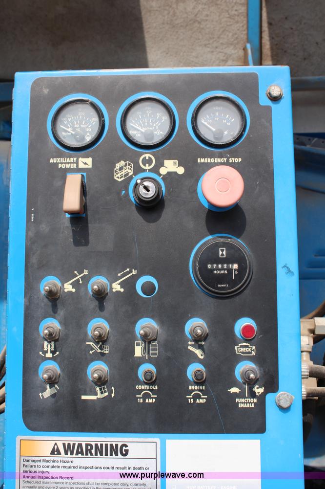 image for item J1081 1999 Genie S85 boom lift