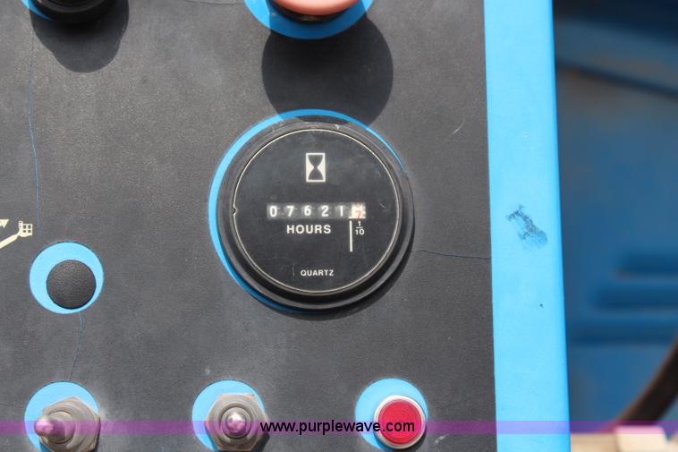 image for item J1081 1999 Genie S85 boom lift