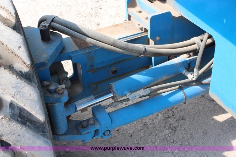 image for item J1081 1999 Genie S85 boom lift