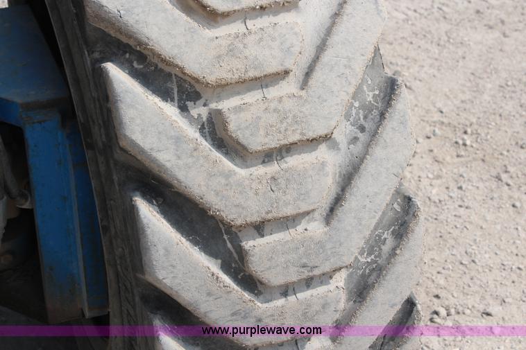 image for item J1081 1999 Genie S85 boom lift