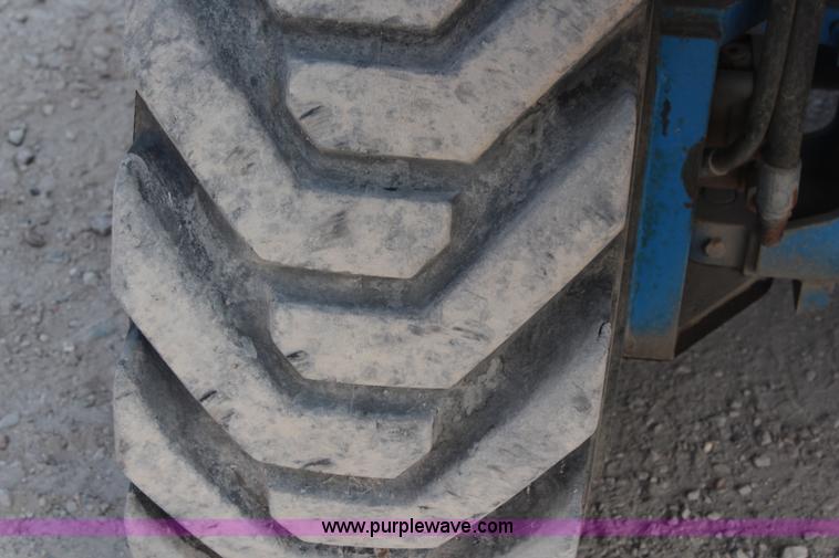 image for item J1081 1999 Genie S85 boom lift