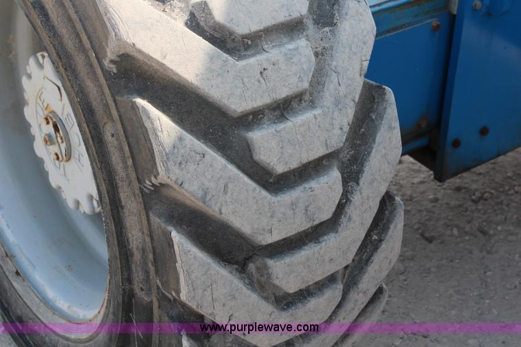 image for item J1081 1999 Genie S85 boom lift