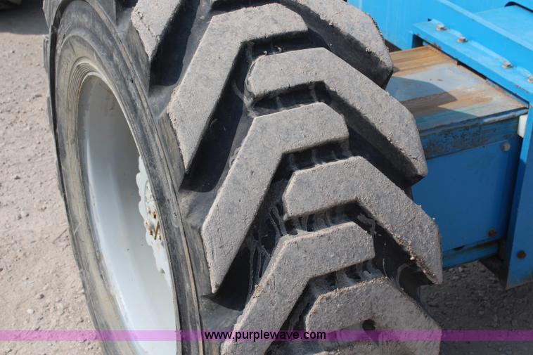 image for item J1081 1999 Genie S85 boom lift