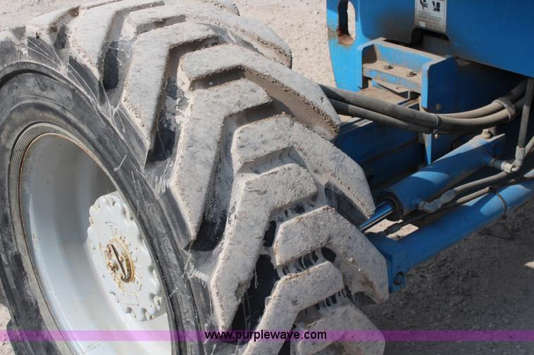 image for item J1081 1999 Genie S85 boom lift