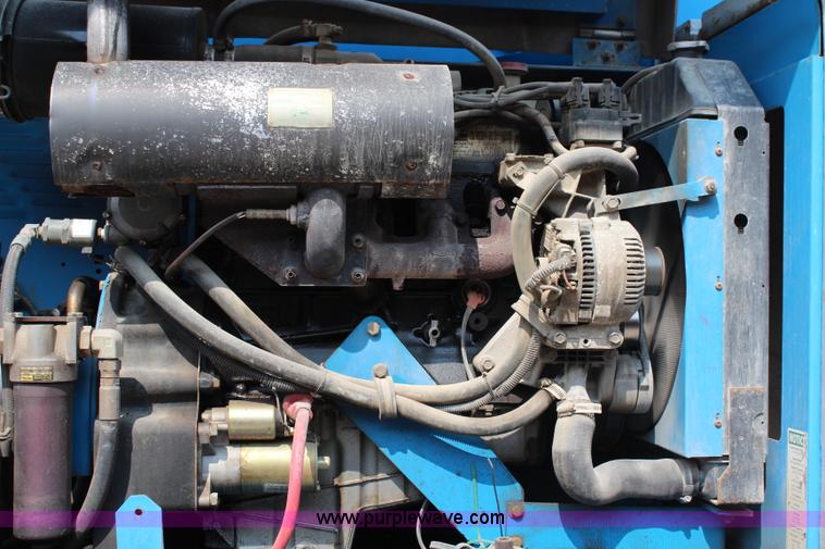 image for item J1082 2000 Genie S60 boom lift