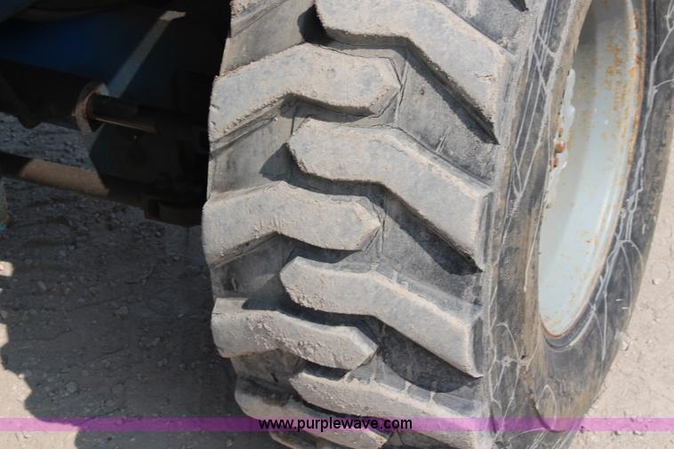 image for item J1082 2000 Genie S60 boom lift