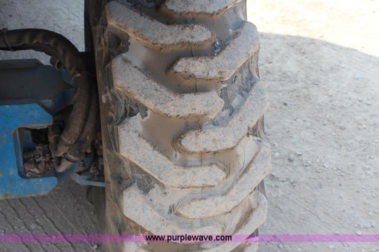 image for item J1082 2000 Genie S60 boom lift