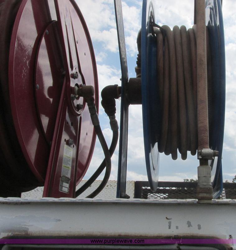 image for item J2469 2002 GMC C6500 service truck