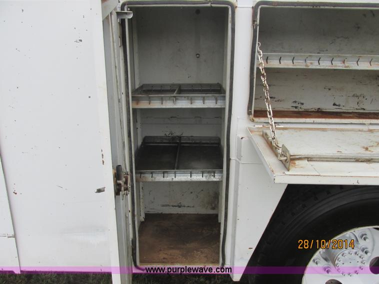 image for item J2469 2002 GMC C6500 service truck