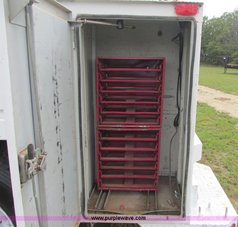 image for item J2469 2002 GMC C6500 service truck