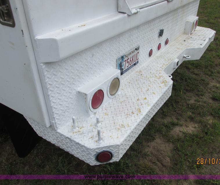 image for item J2469 2002 GMC C6500 service truck