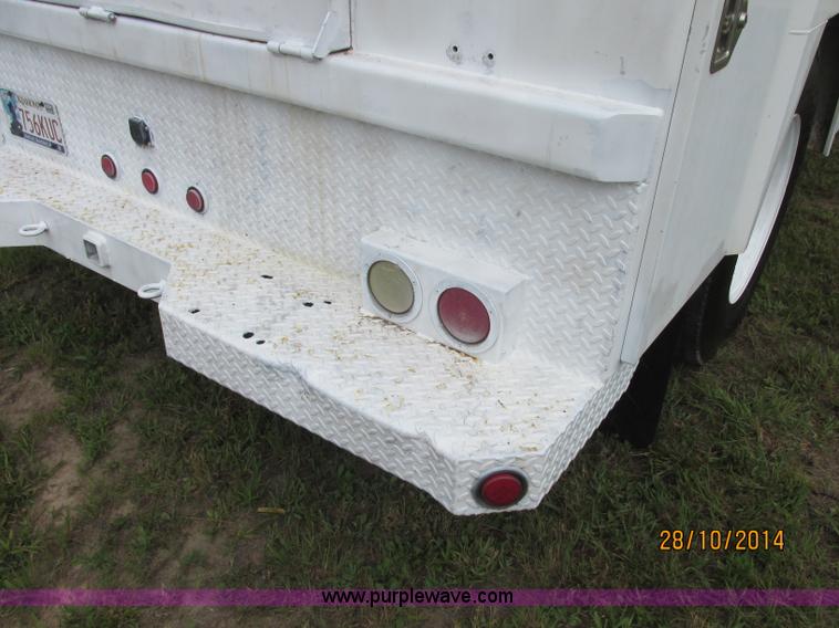 image for item J2469 2002 GMC C6500 service truck