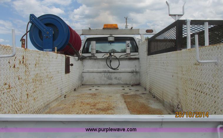 image for item J2469 2002 GMC C6500 service truck