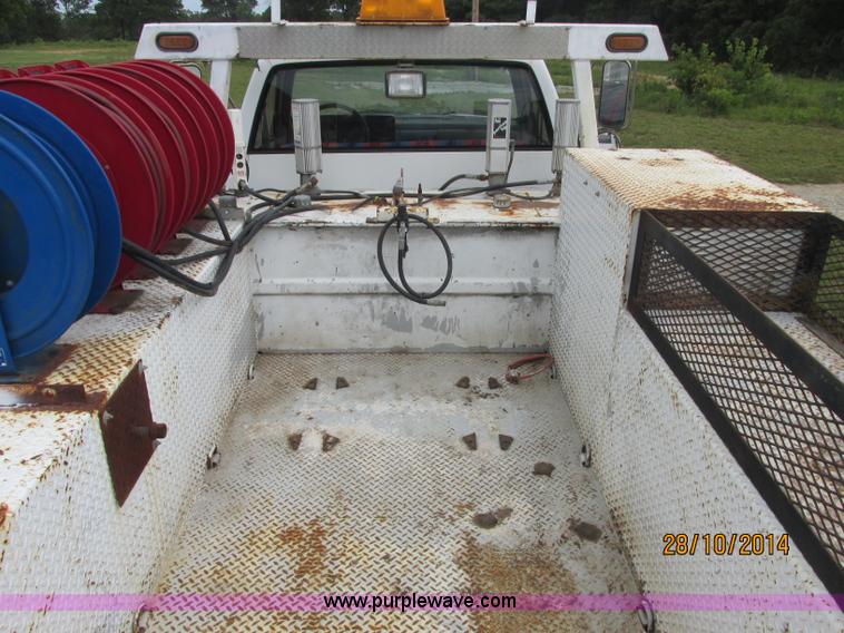 image for item J2469 2002 GMC C6500 service truck