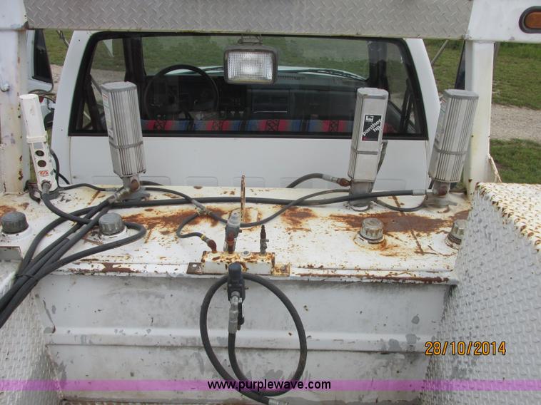 image for item J2469 2002 GMC C6500 service truck