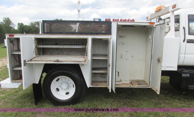 image for item J2469 2002 GMC C6500 service truck