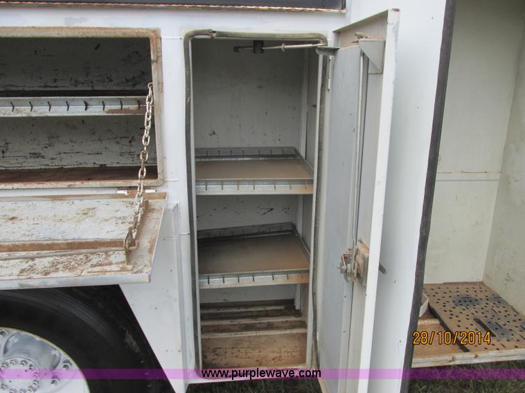 image for item J2469 2002 GMC C6500 service truck