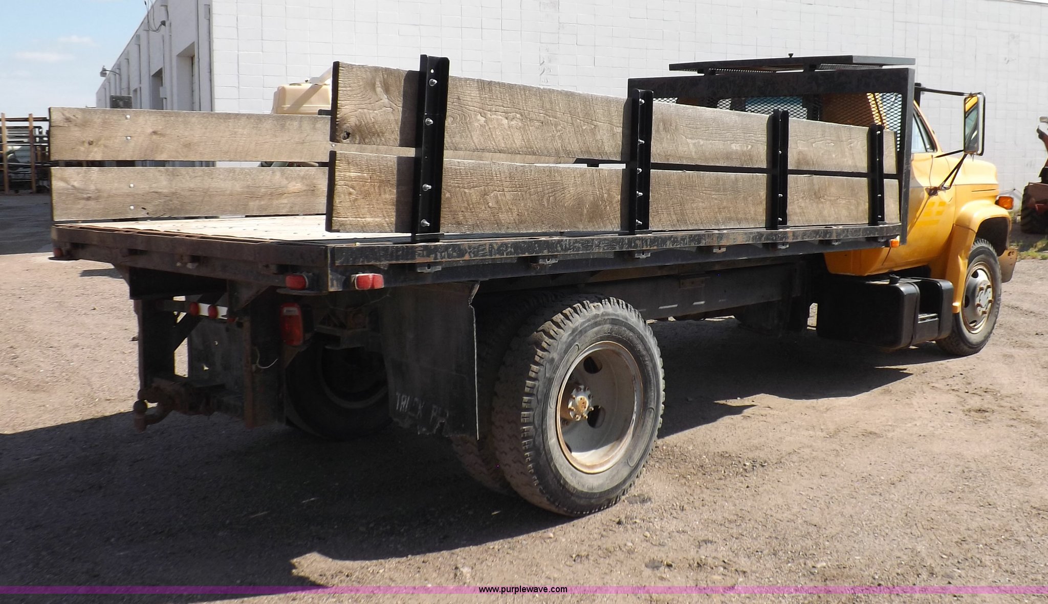1988 GMC C6000 dump truck in Garden City, KS | Item H9227 sold | Purple