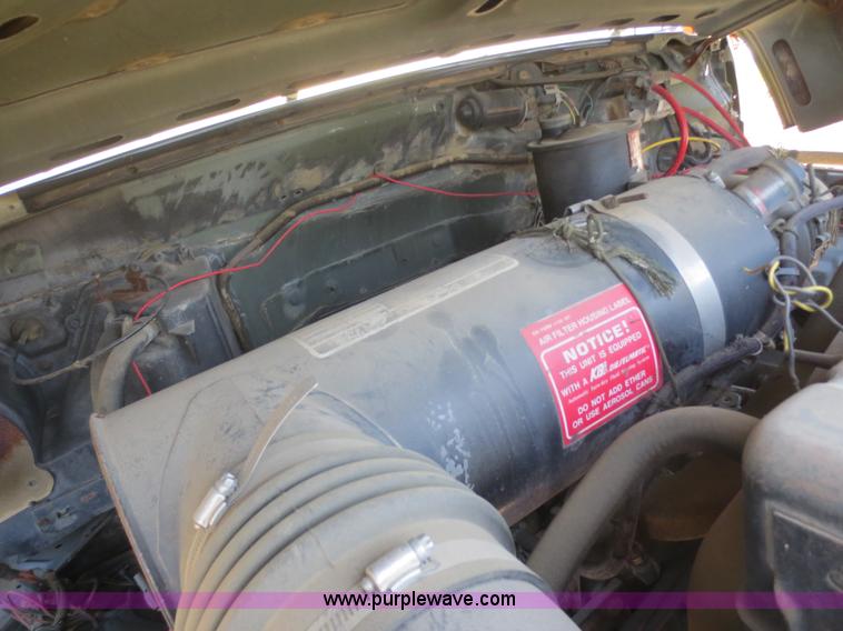 image for item B4742 1989 Ford F800 flatbed truck