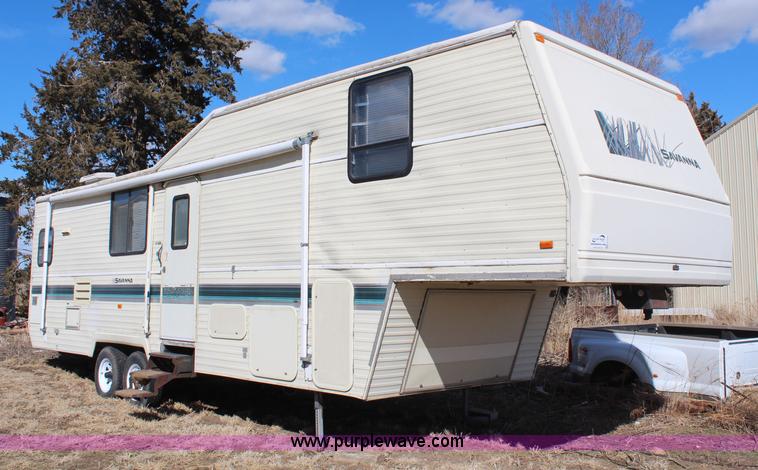 image for item H1419 1994 Fleetwood Savanna camper