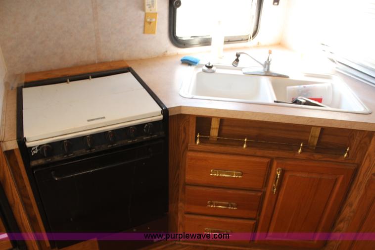 image for item H1419 1994 Fleetwood Savanna camper