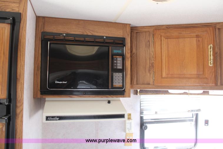 image for item H1419 1994 Fleetwood Savanna camper